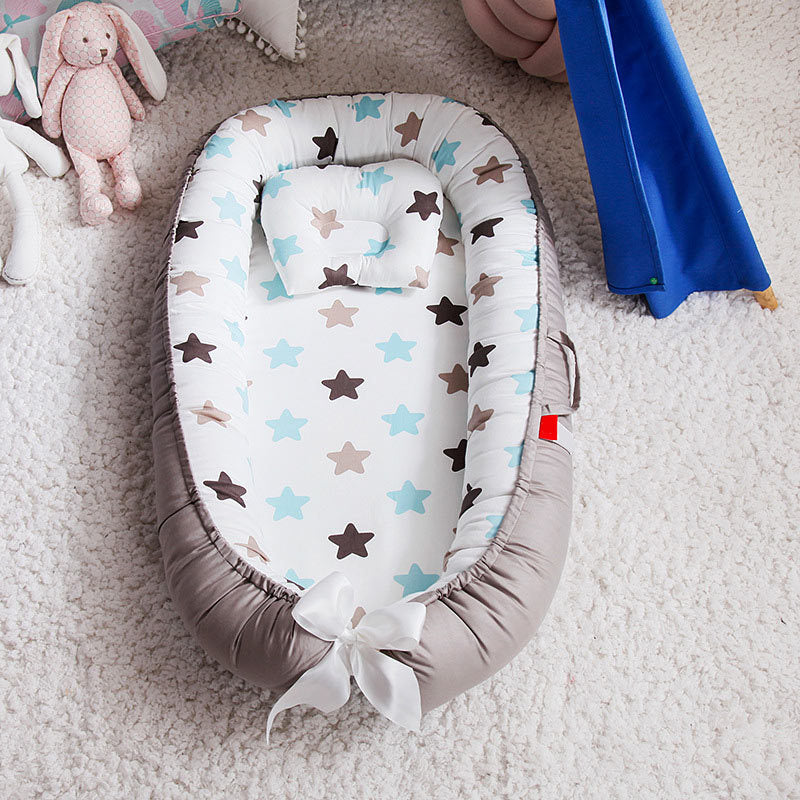 Réducteur de Lit Bébé - Nuna
