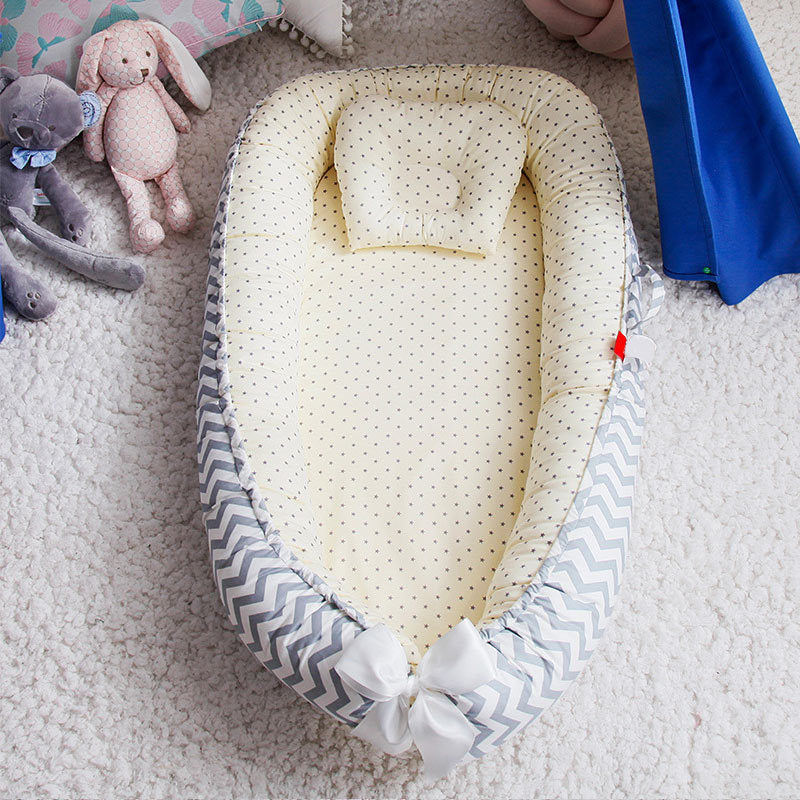 Réducteur de Lit Bébé - Nuna