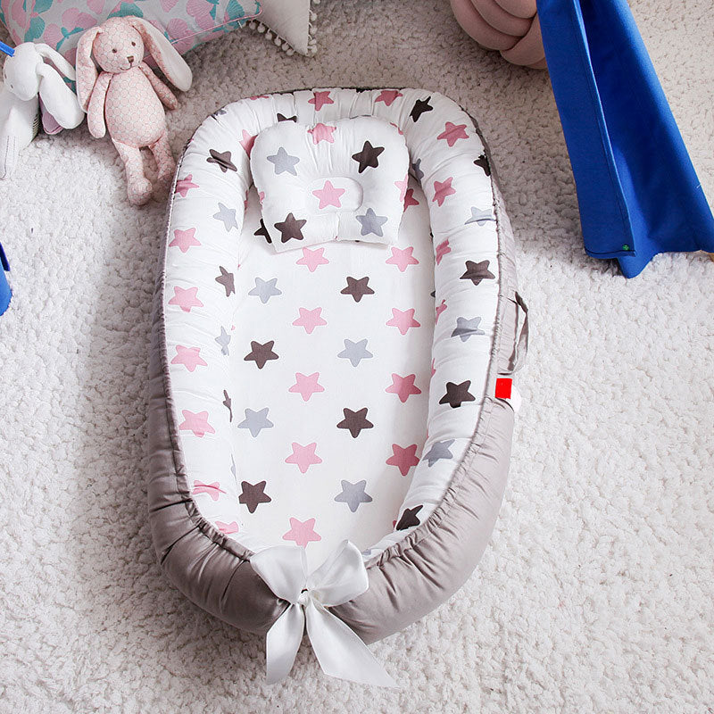 Réducteur de Lit Bébé - Nuna