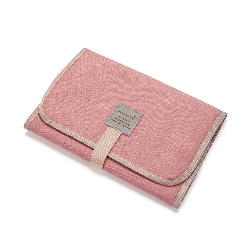 Tapis à langer de voyage pliable