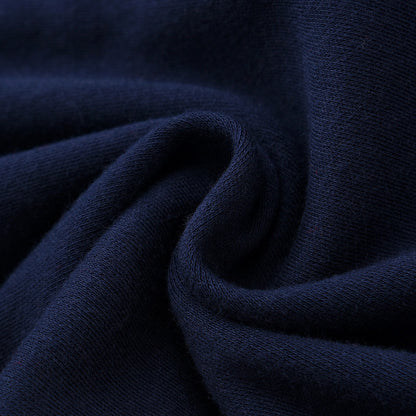 Maille de la grenouillère bébé bleu marine en gros plan