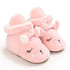 Chaussons bébé de Noël faon rose fourrés à pressions
