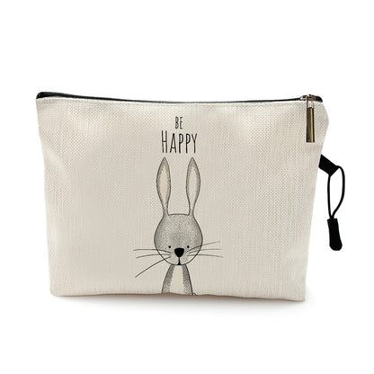 Trousse de voyage bébé à motif animal coloris lapin