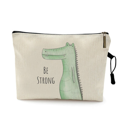 Trousse de voyage bébé à motif animal coloris crocodile